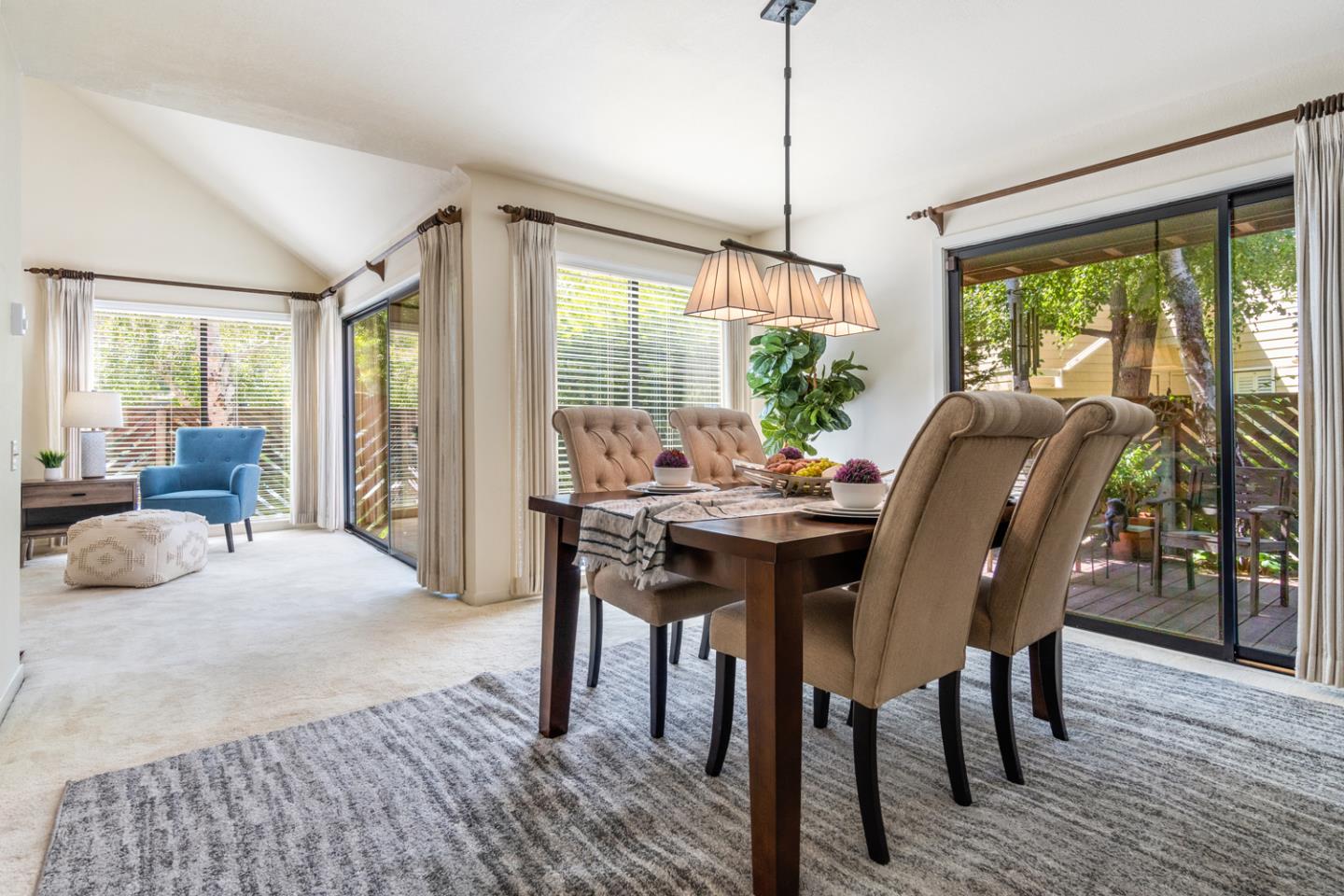 910 Wharfside Road San Mateo, CA 94404 - Photo 6 of 43 a view of a dining room with furniture window and wooden floor