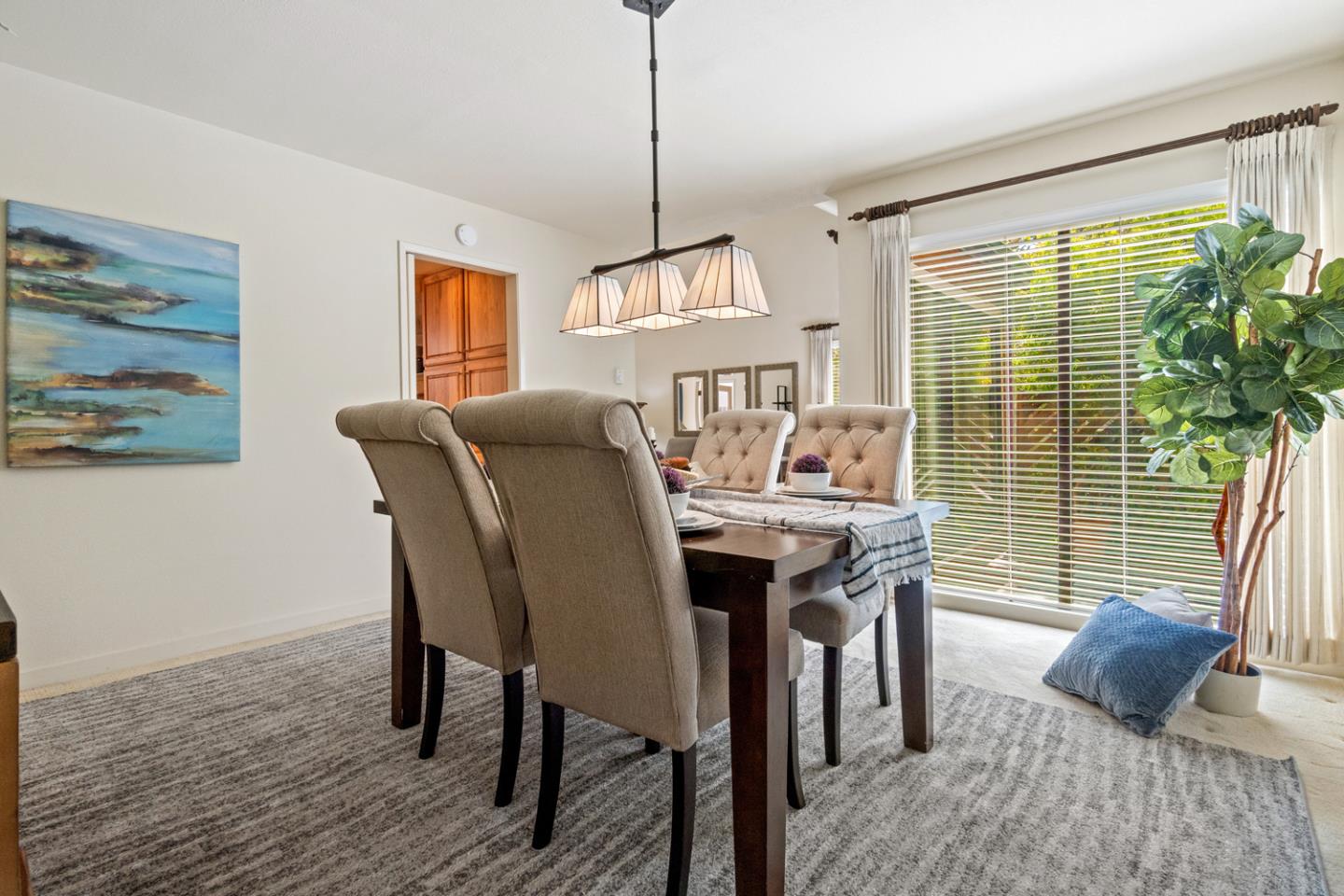910 Wharfside Road San Mateo, CA 94404 - Photo 7 of 43 a dining room with furniture and window
