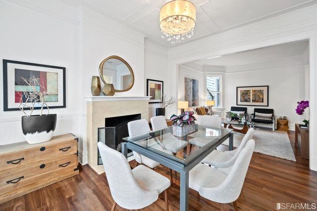 a kitchen with stainless steel appliances granite countertop a stove and a refrigerator