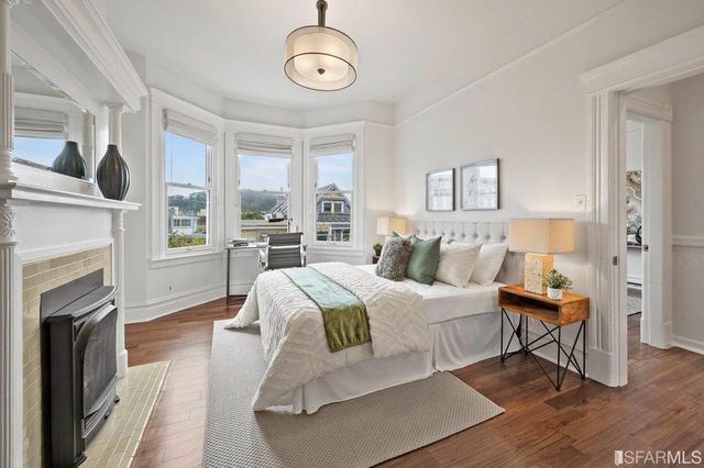 a view of a backyard with plants and a patio