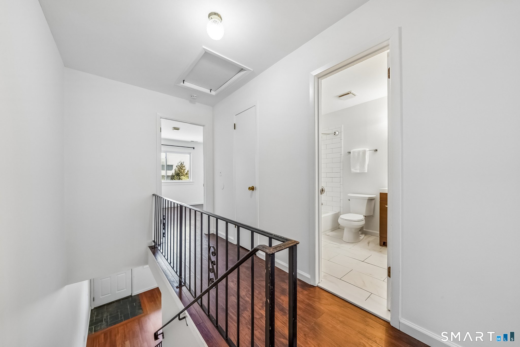 14 Ferris Avenue, Unit 9 Norwalk, CT 06854 - Photo 9 of 20 a view of a hallway with wooden floor and entryway