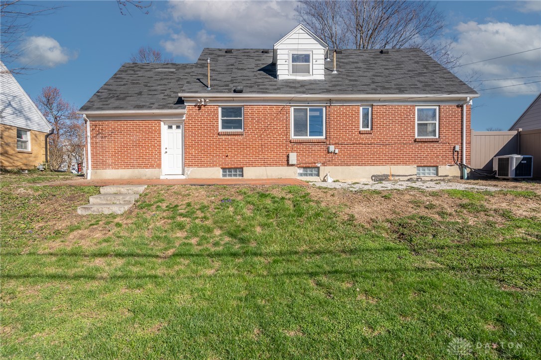 326 North Bromfield Road Kettering, OH 45429 - Photo 28 of 30 This classic brick residence features a durable shingle roof and a spacious backyard.