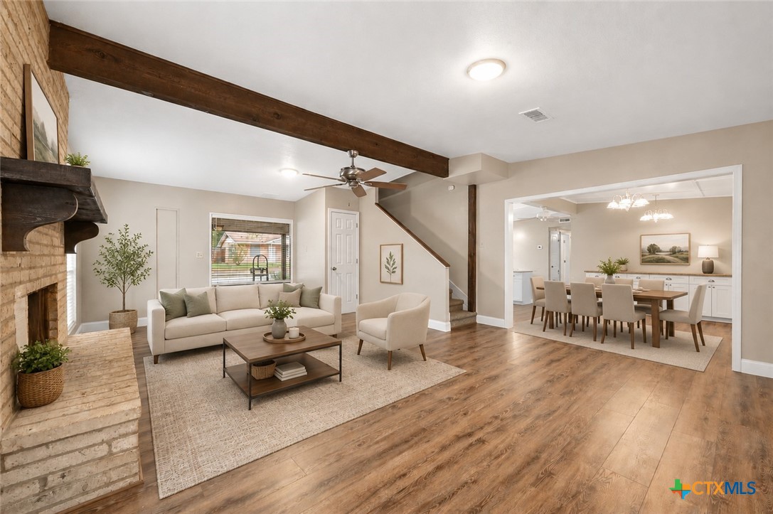 102 Rivercrest Street Luling, TX 78648 - Photo 4 of 36 a living room with furniture and a wooden floor