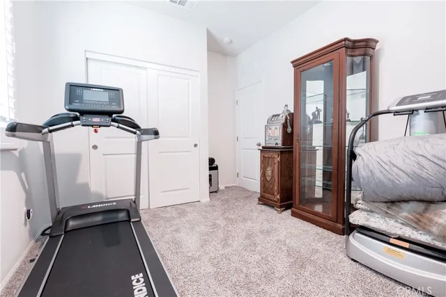 a view of hallway with livingroom