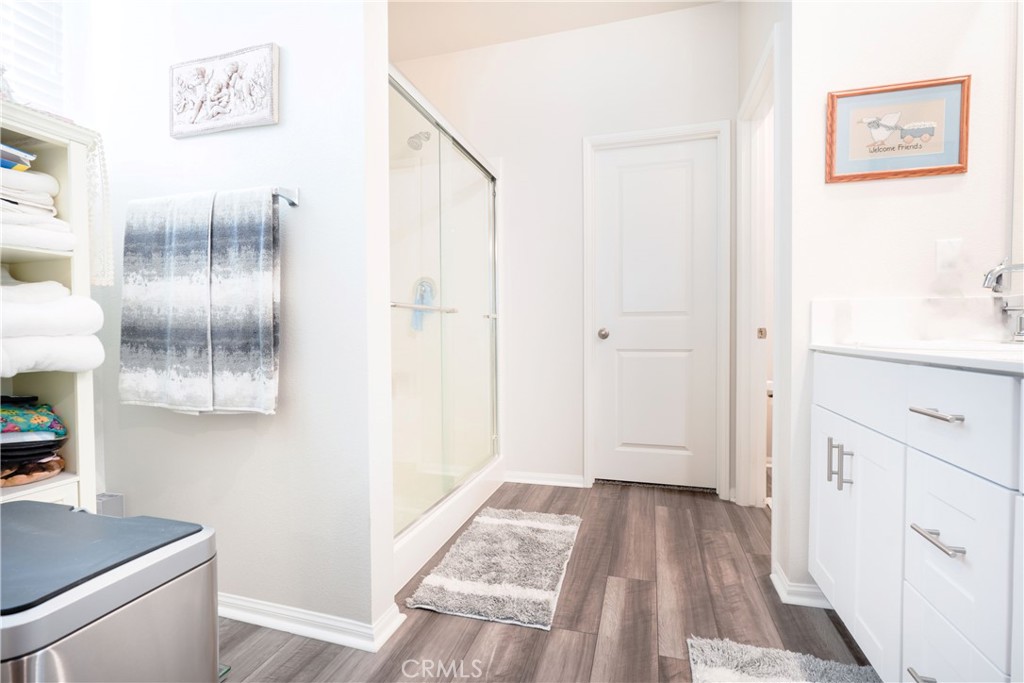 15630 Raptor Road Moreno Valley, CA 92551 - Photo 21 of 25 a view of a hallway and an dining rom with furniture