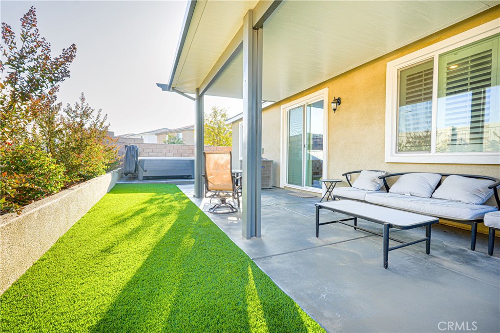 15630 Raptor Road Moreno Valley, CA 92551 - Photo 25 of 25 a balcony with couple of chairs and a table