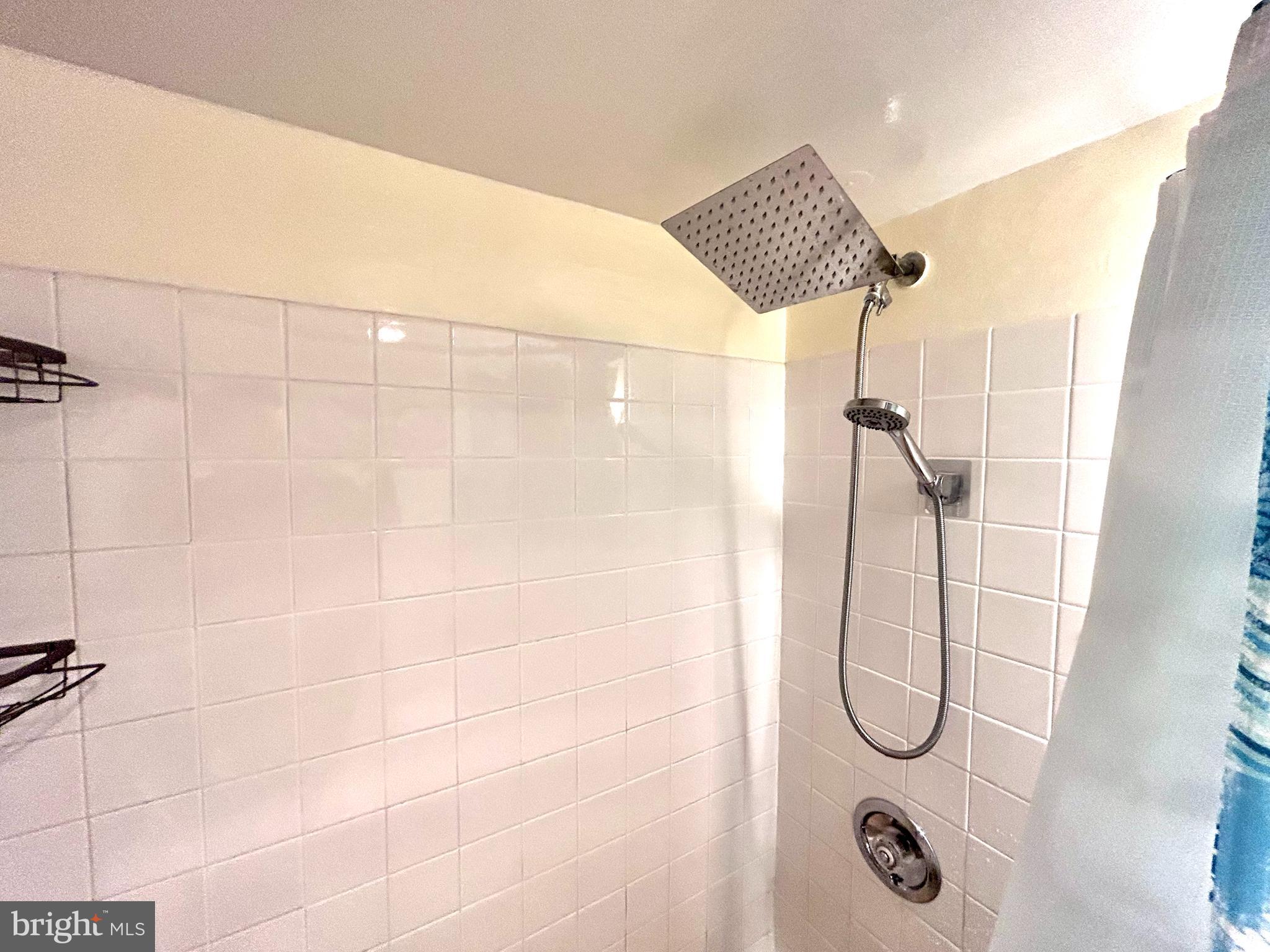 224 West Rittenhouse Square, Unit 1702 Philadelphia, PA 19103 - Photo 12 of 16 a bathroom with a shower