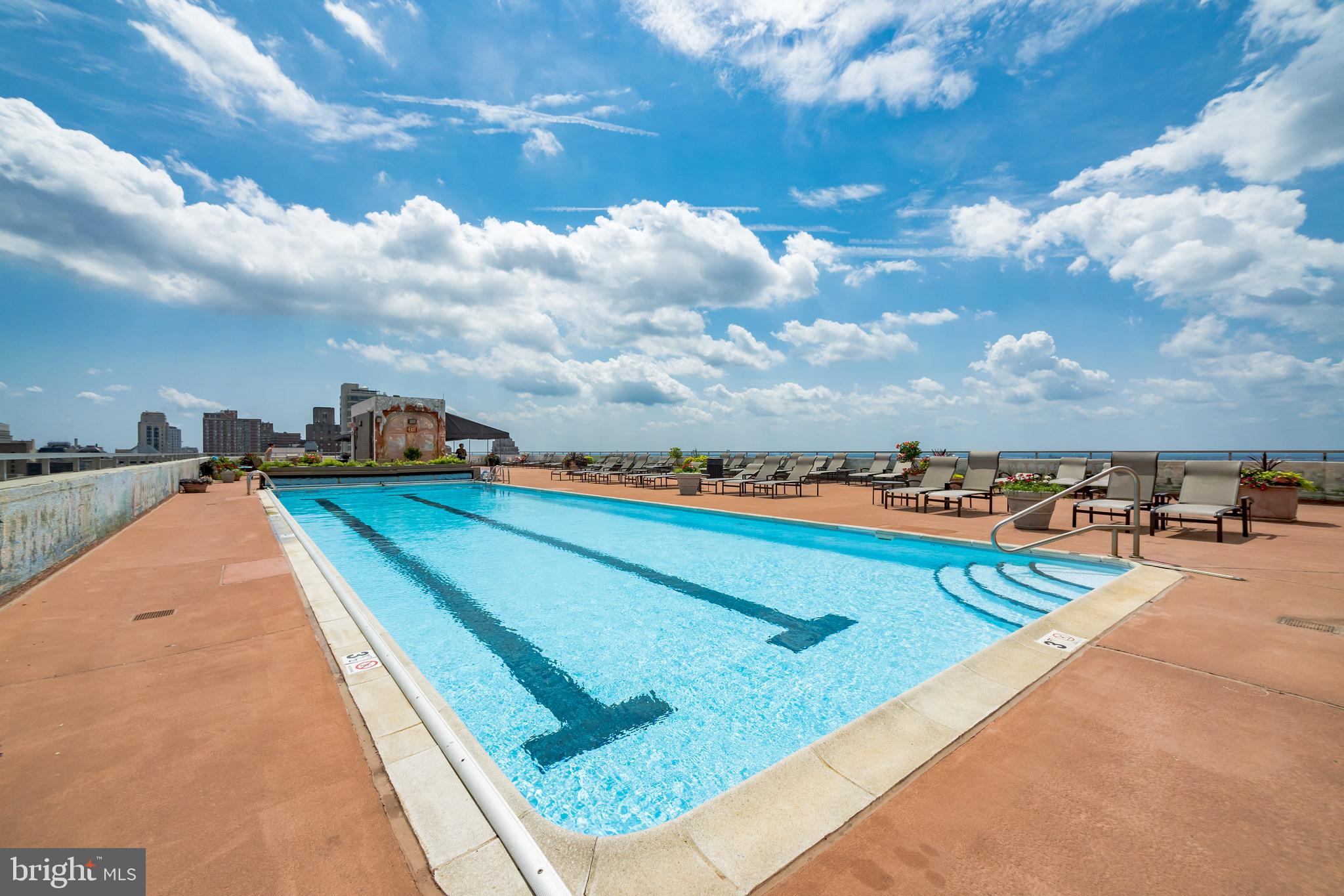 224 West Rittenhouse Square, Unit 1702 Philadelphia, PA 19103 - Photo 15 of 16 a view of a swimming pool with an outdoor seating