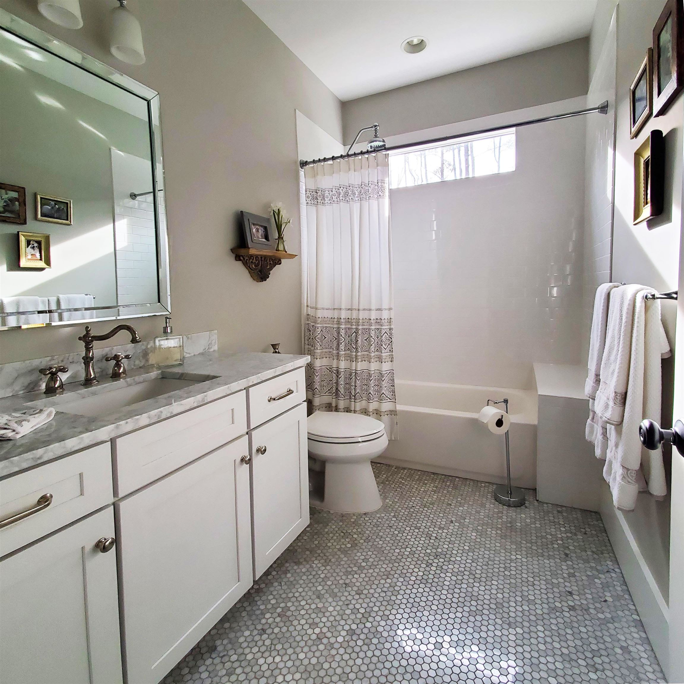 12628 Old Creedmoor Road Raleigh, NC 27613 - Photo 17 of 32 a bathroom with a granite countertop sink toilet and shower