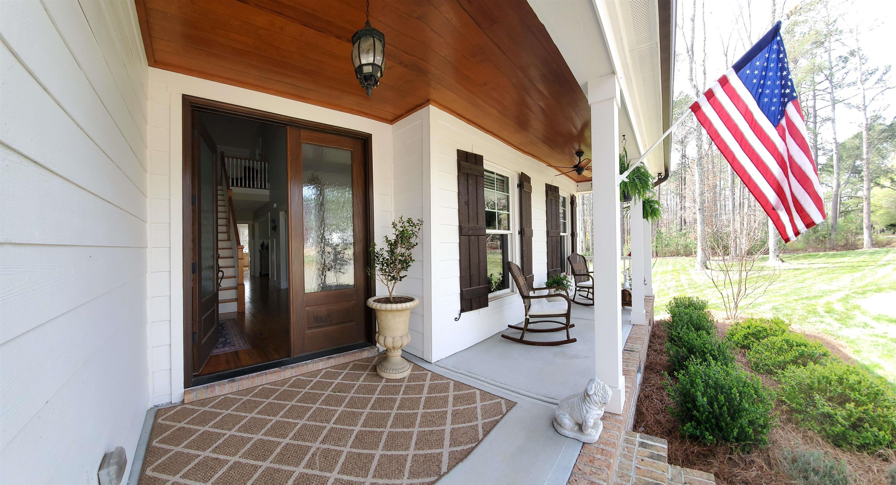 12628 Old Creedmoor Road Raleigh, NC 27613 - Photo 2 of 32 a view of a house with outdoor space