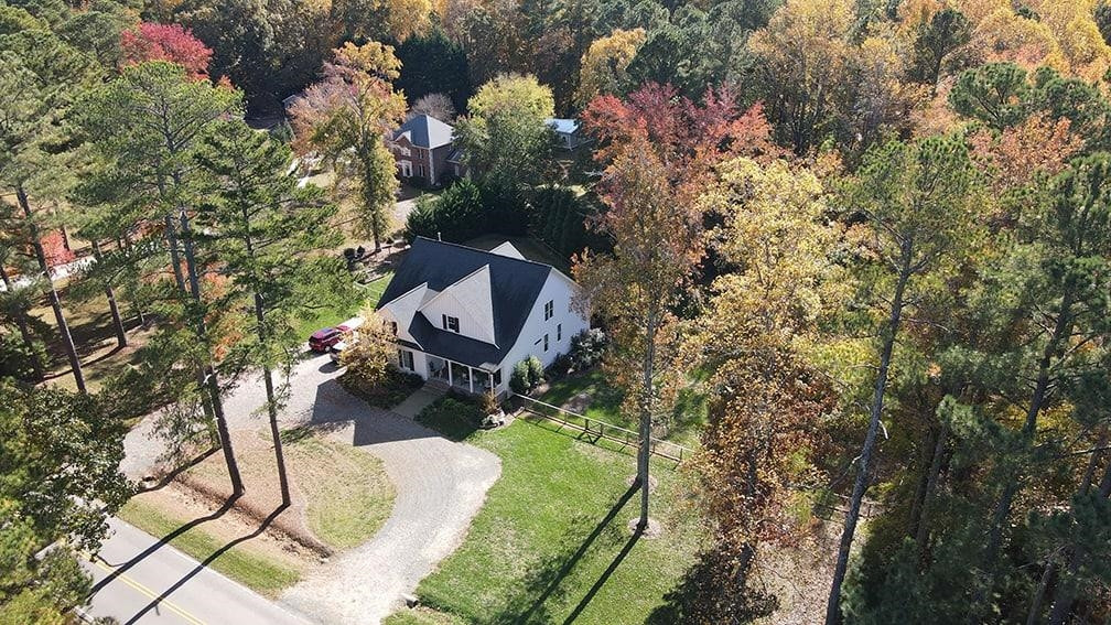 12628 Old Creedmoor Road Raleigh, NC 27613 - Photo 31 of 32 view of a house with a yard and sitting area