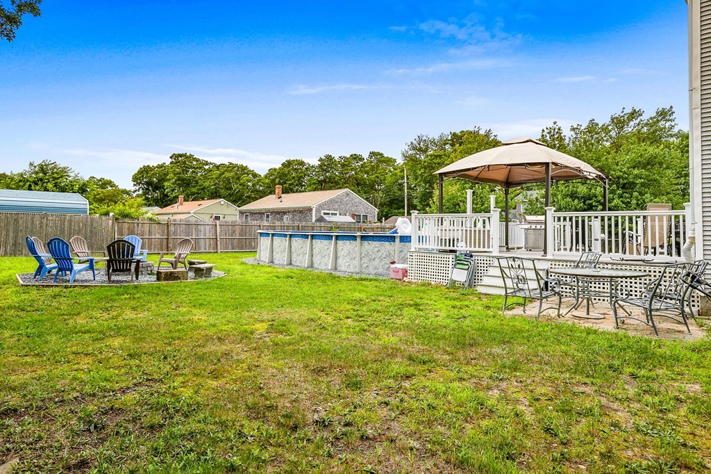 46 Cohasset Road Wareham, MA 02532 - Photo 5 of 42 a view of a house with a yard and sitting area