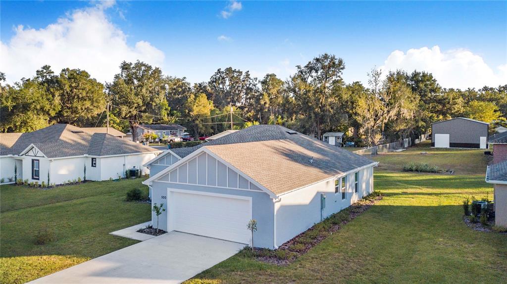 500 9th Street Northeast Fort Meade, FL 33841 - Photo 31 of 33 a aerial view of a house with a yard table and chairs