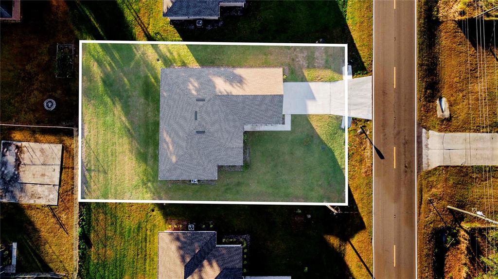 500 9th Street Northeast Fort Meade, FL 33841 - Photo 32 of 33 an aerial view of a house with a garden