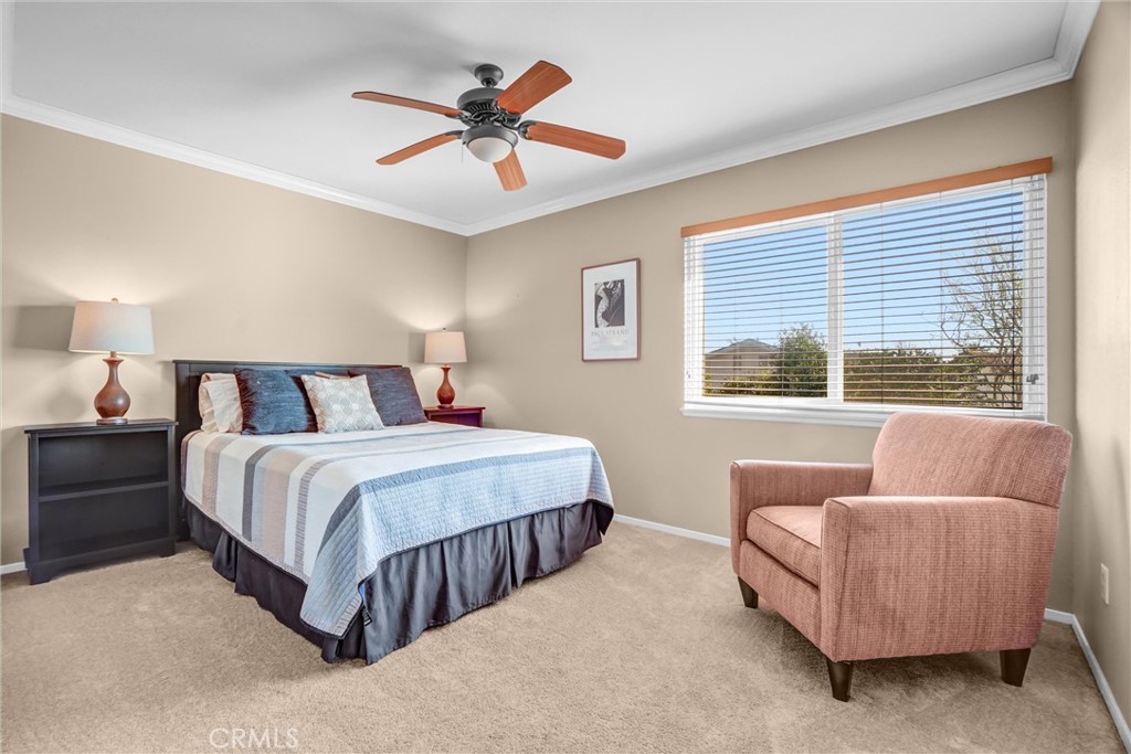 5552 Ridgebury Drive Huntington Beach, CA 92649 - Photo 20 of 31 a bedroom with a bed and window