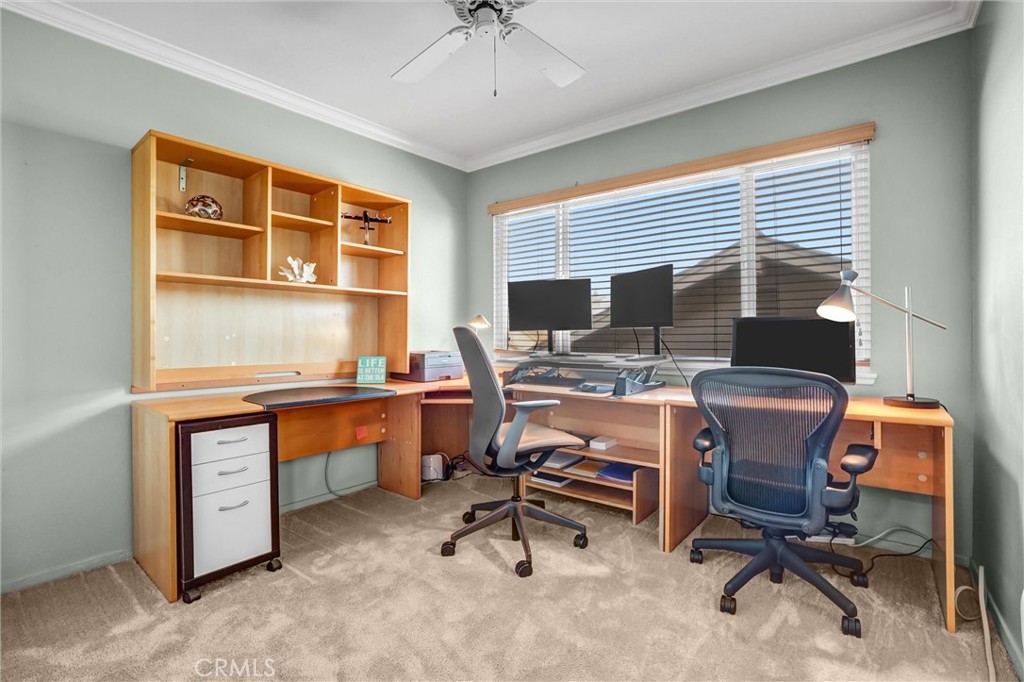 5552 Ridgebury Drive Huntington Beach, CA 92649 - Photo 21 of 31 a view of a workspace with furniture