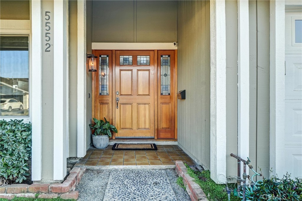 5552 Ridgebury Drive Huntington Beach, CA 92649 - Photo 3 of 31 a view of an entrance door of the house