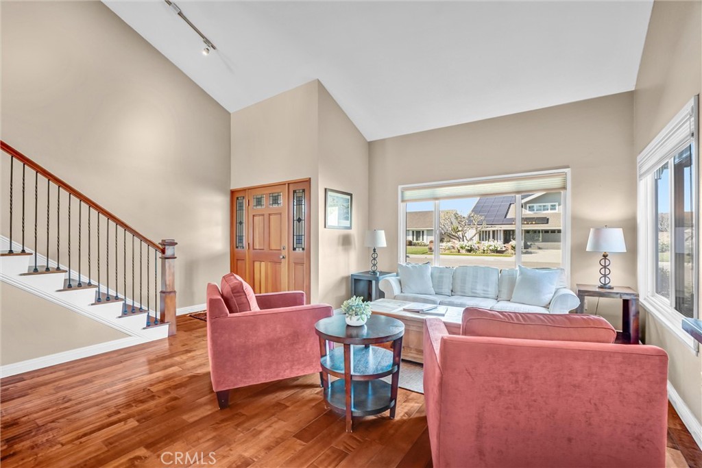 5552 Ridgebury Drive Huntington Beach, CA 92649 - Photo 5 of 31 a living room with furniture and wooden floor