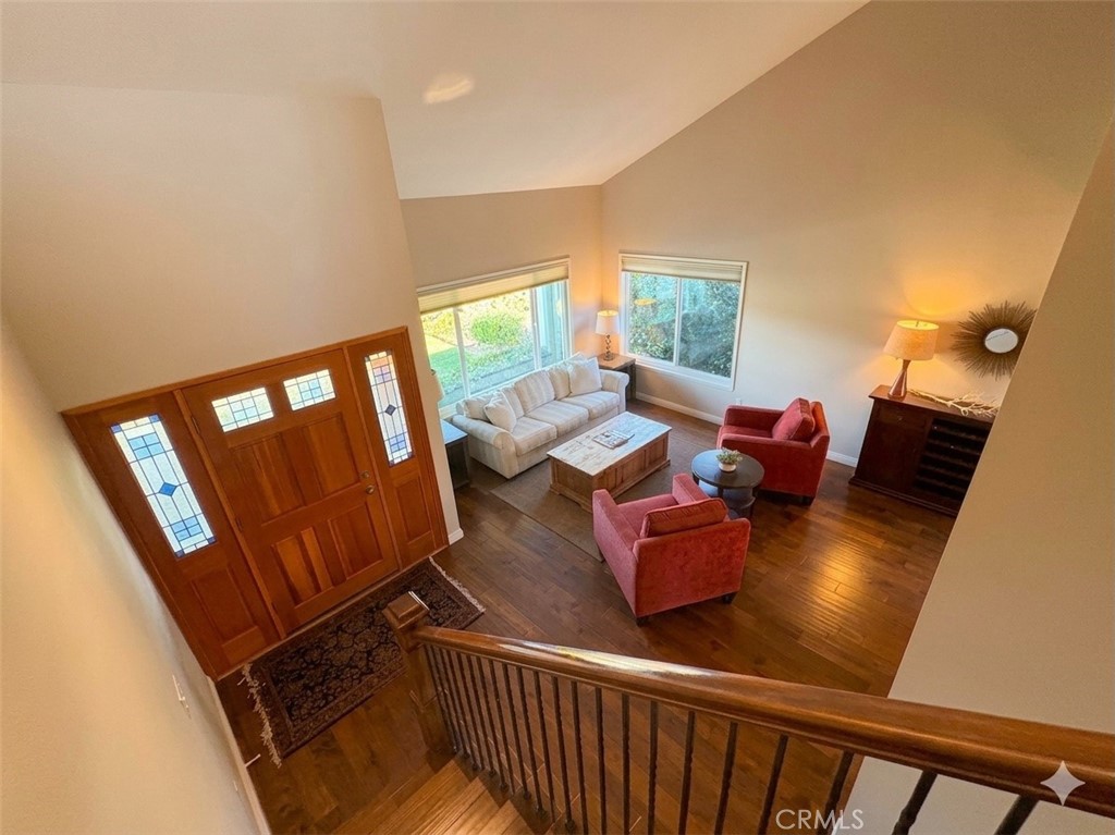 5552 Ridgebury Drive Huntington Beach, CA 92649 - Photo 6 of 31 a living room with furniture and a window