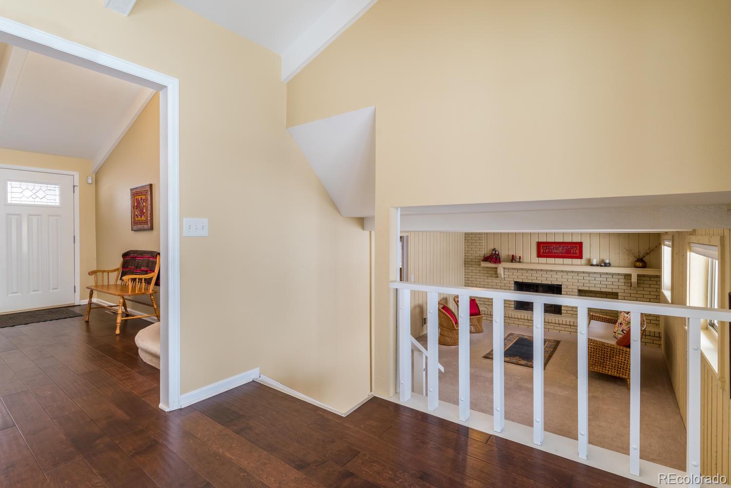 4311 Carter Trail Boulder, CO 80301 - Photo 15 of 35 a view of a livingroom with wooden floor and windows