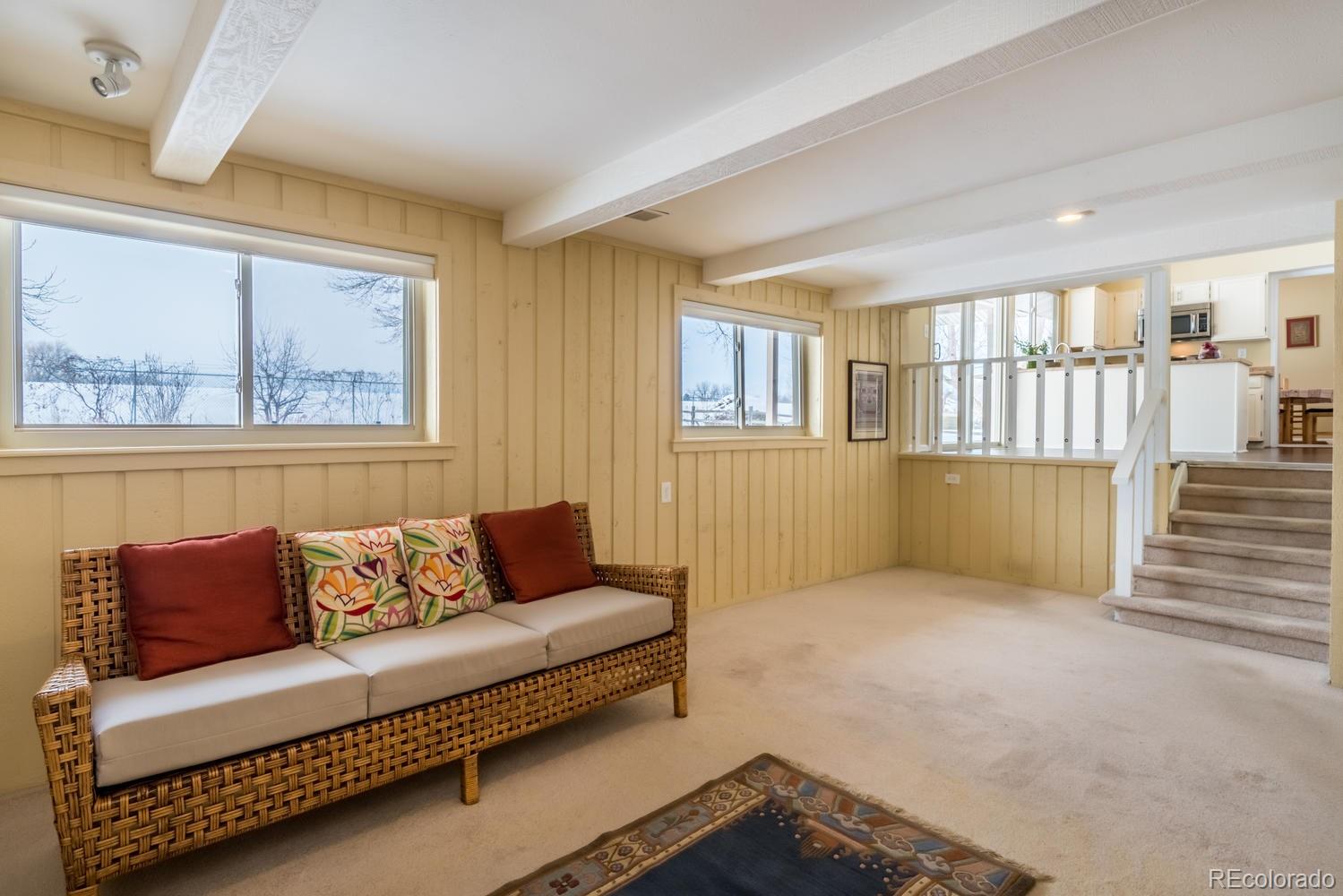 4311 Carter Trail Boulder, CO 80301 - Photo 16 of 35 a living room with furniture and a window