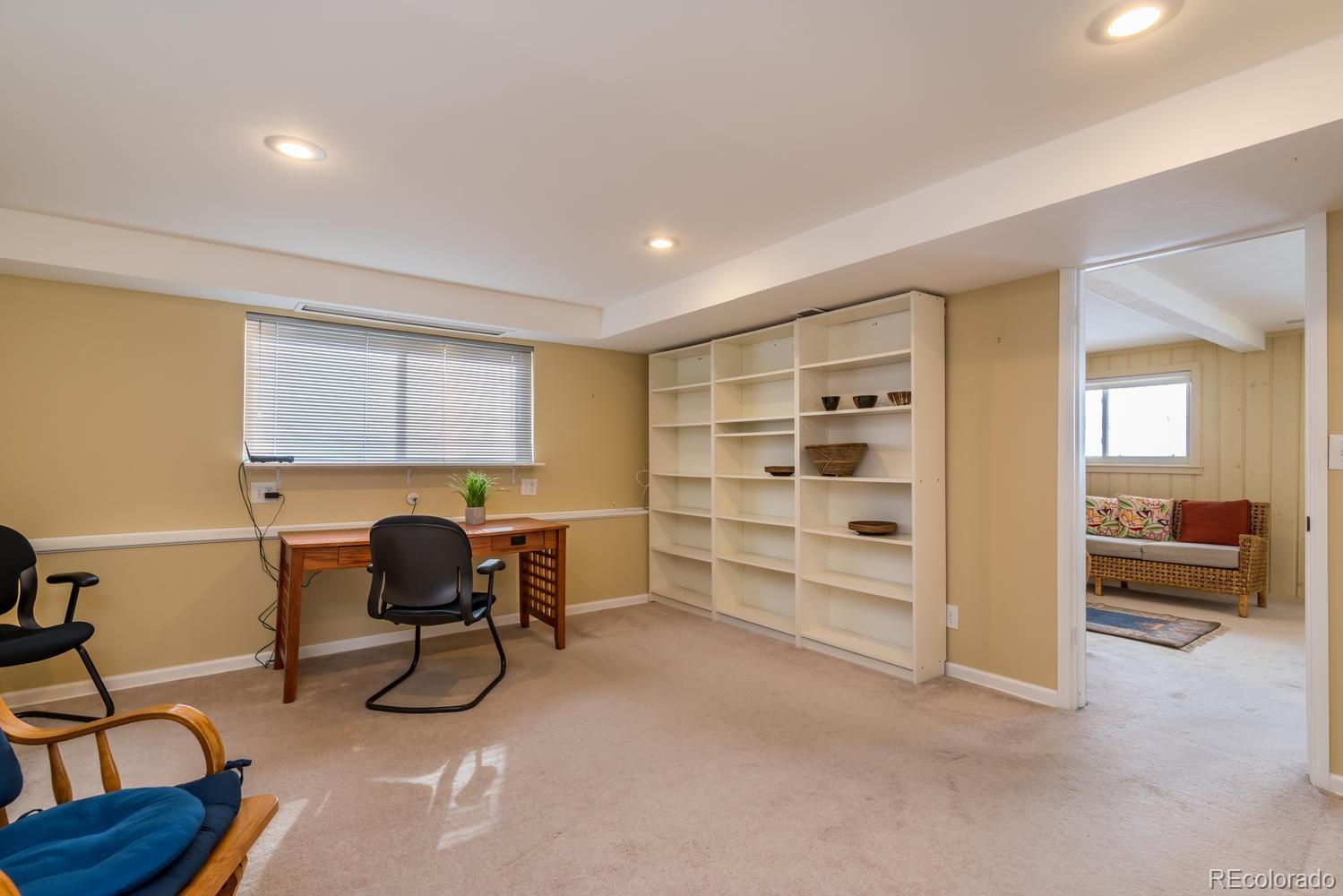 4311 Carter Trail Boulder, CO 80301 - Photo 18 of 35 a view of a workspace with furniture and windows