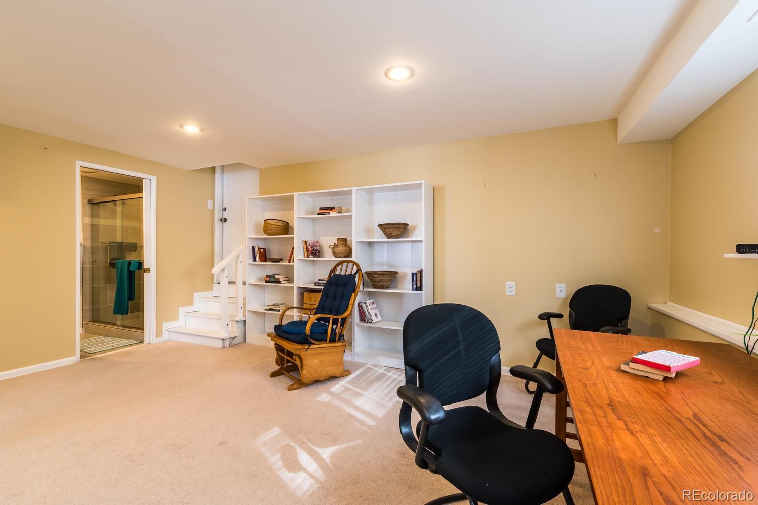 4311 Carter Trail Boulder, CO 80301 - Photo 19 of 35 a view of a workspace with furniture and gym equipment