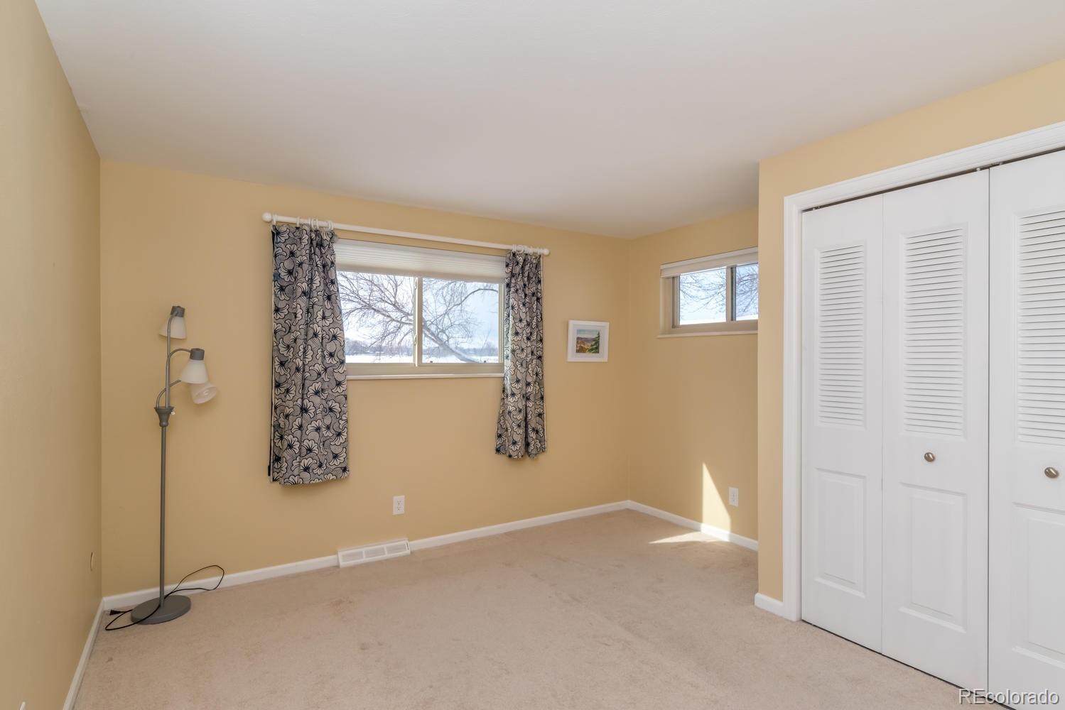 4311 Carter Trail Boulder, CO 80301 - Photo 23 of 35 an empty room with windows