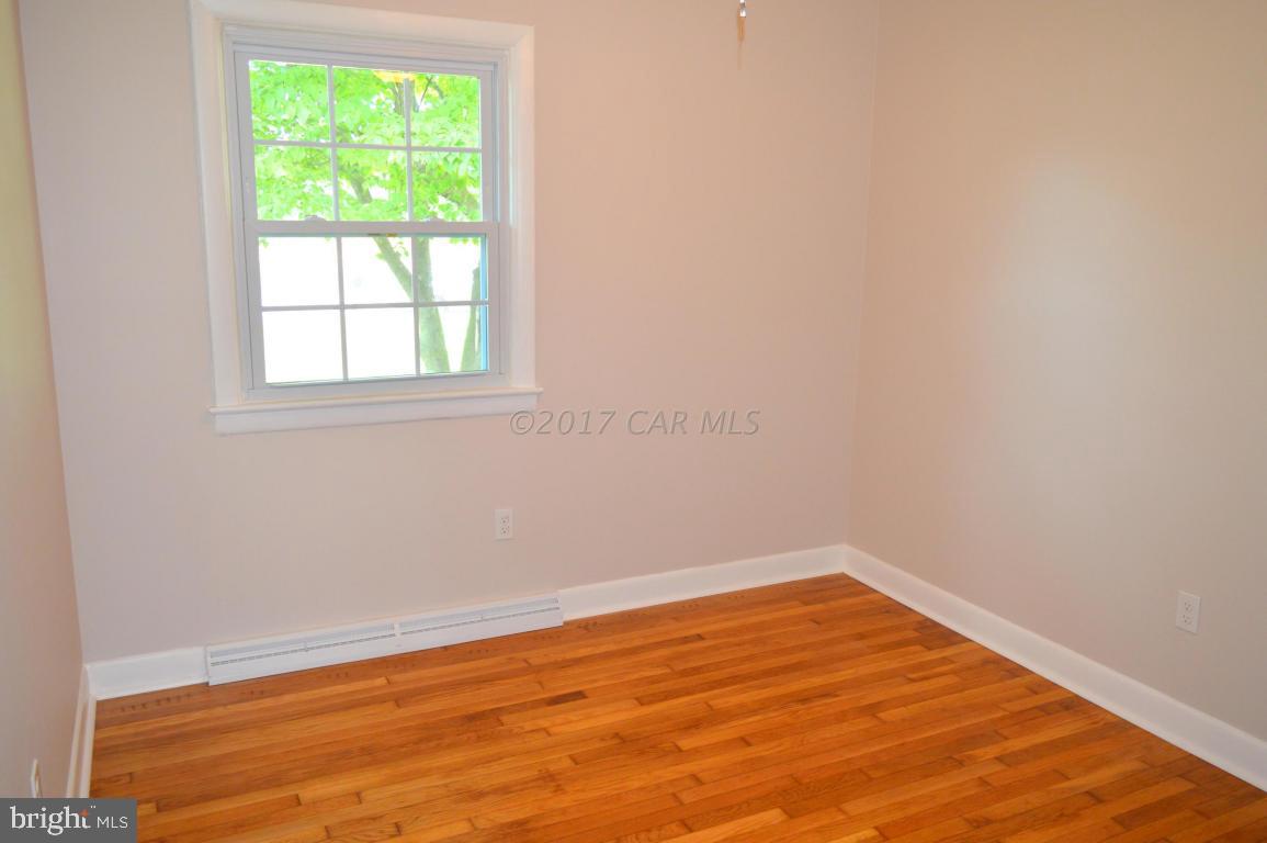 20306 Nanticoke Road Nanticoke, MD 21840 - Photo 16 of 24 an empty room with a window