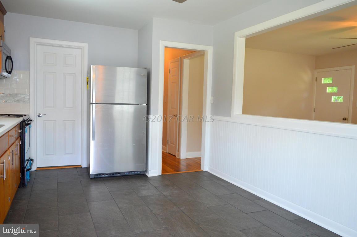 20306 Nanticoke Road Nanticoke, MD 21840 - Photo 3 of 24 a view of empty room with closet and wooden floor