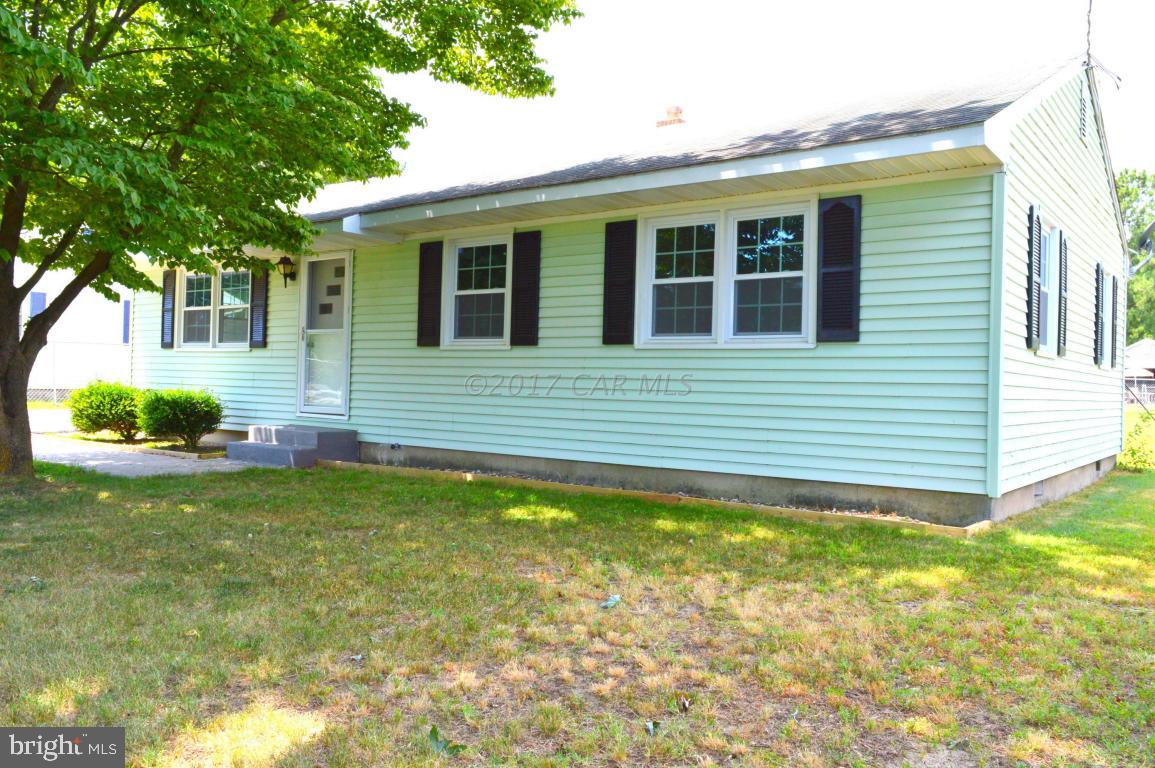 20306 Nanticoke Road Nanticoke, MD 21840 - Photo 22 of 24 a view of a house with pool and a yard