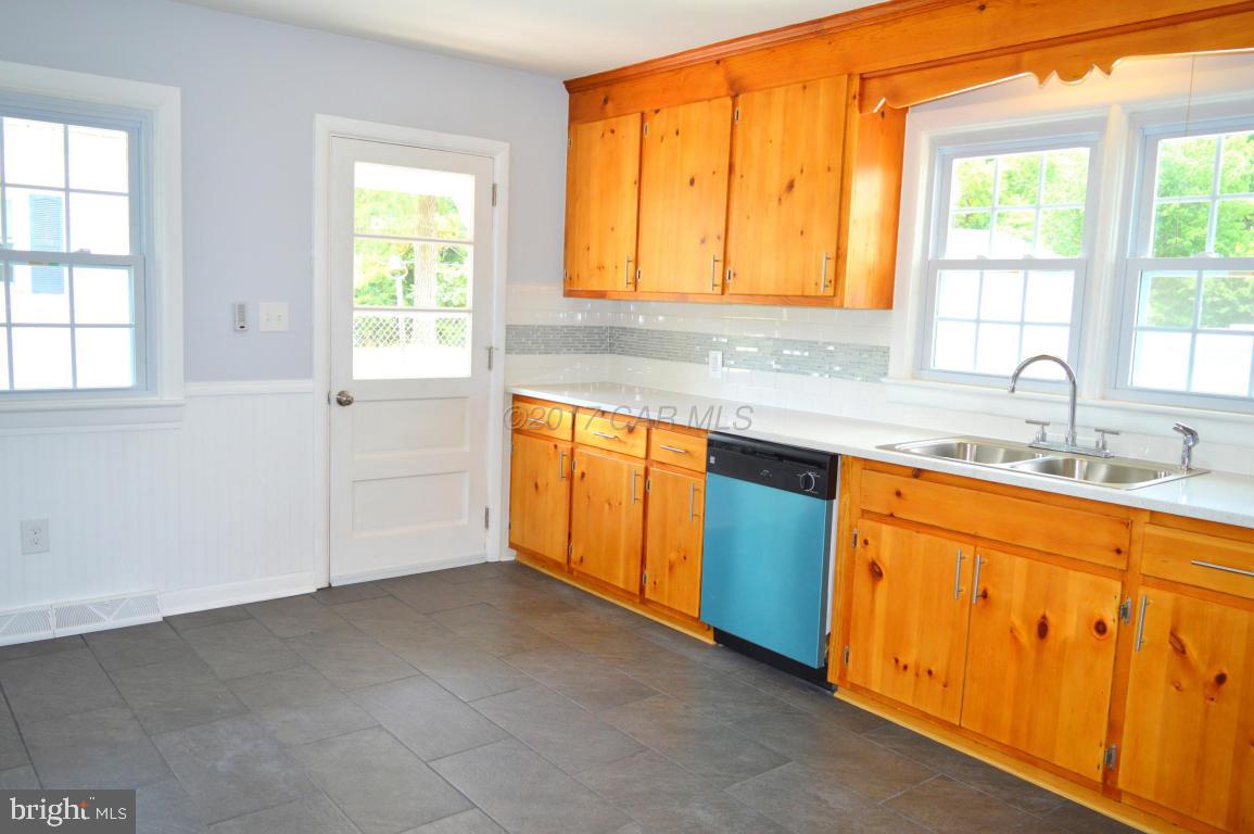 20306 Nanticoke Road Nanticoke, MD 21840 - Photo 5 of 24 a view of a kitchen with sink and window