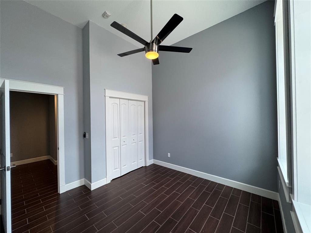 2901 Lee Street, Unit 2 Greenville, TX 75401 - Photo 10 of 14 a view of empty room with wooden floor