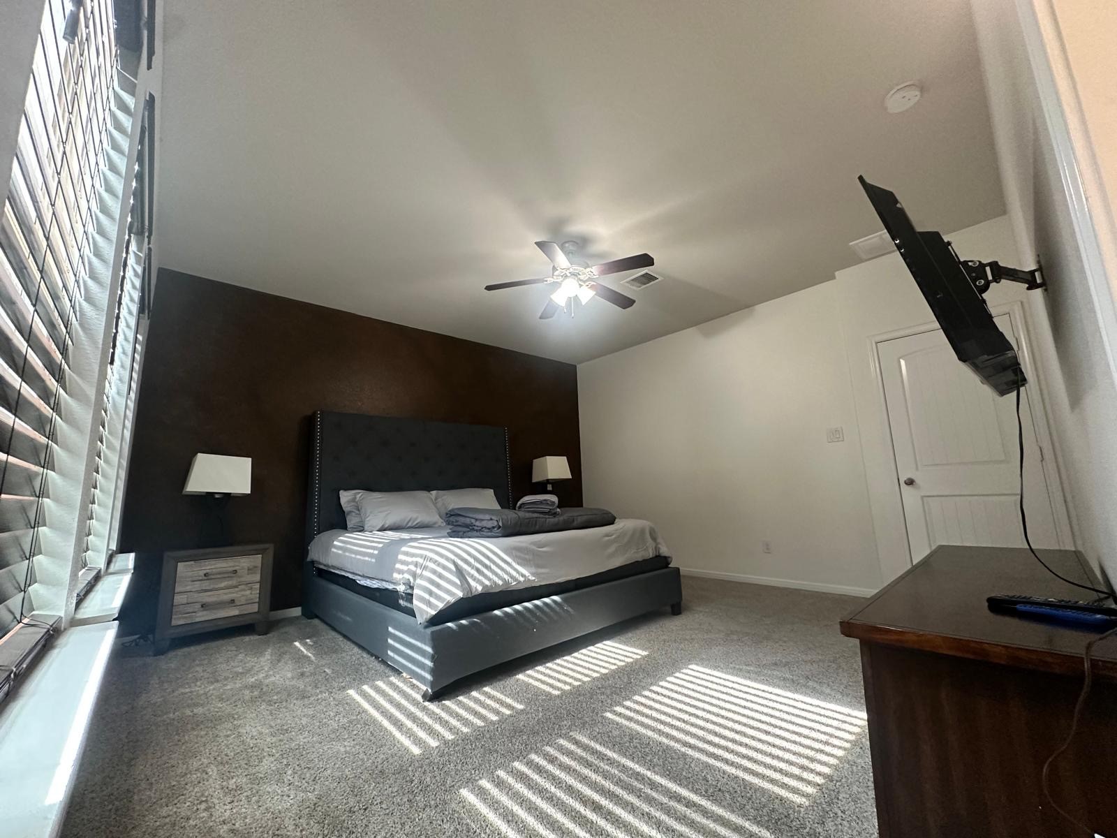 3322 Harvest Meadow Lane Rosenberg, TX 77471 - Photo 29 of 39 a bedroom with a bed and a mirror