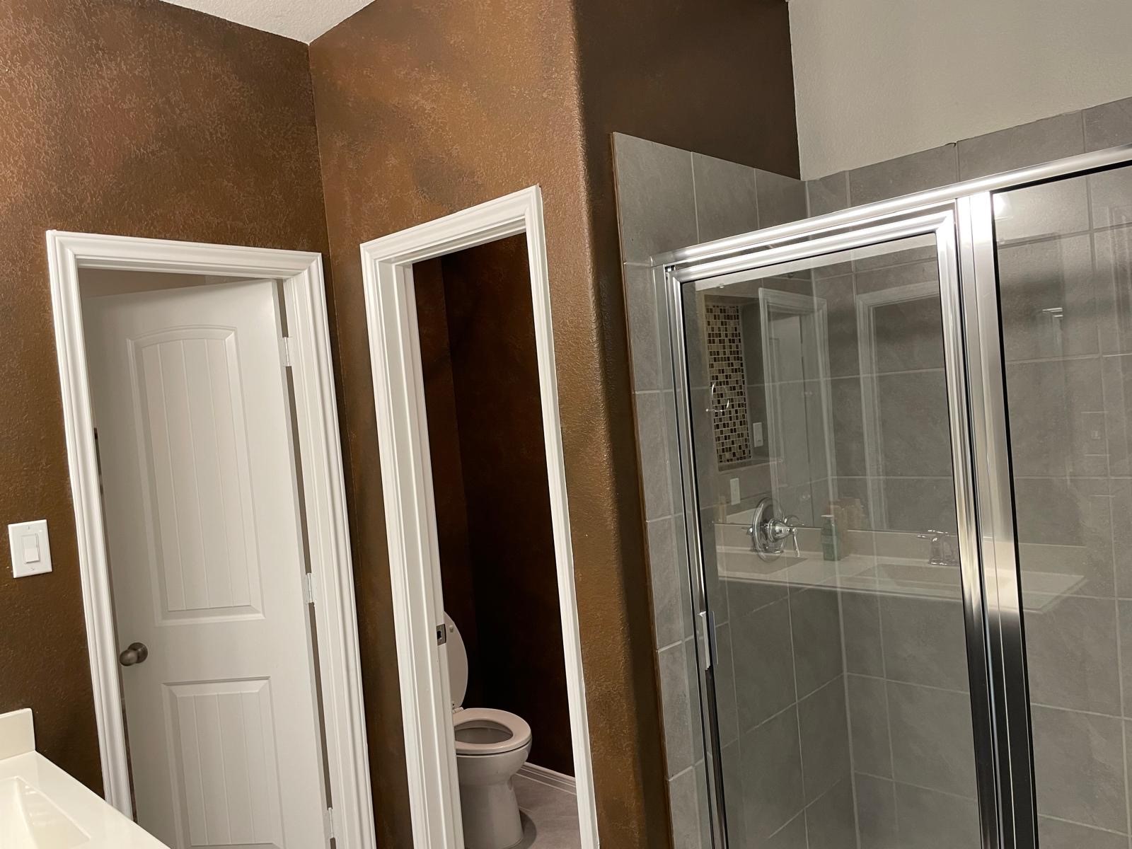 3322 Harvest Meadow Lane Rosenberg, TX 77471 - Photo 36 of 39 a bathroom with a glass door shower