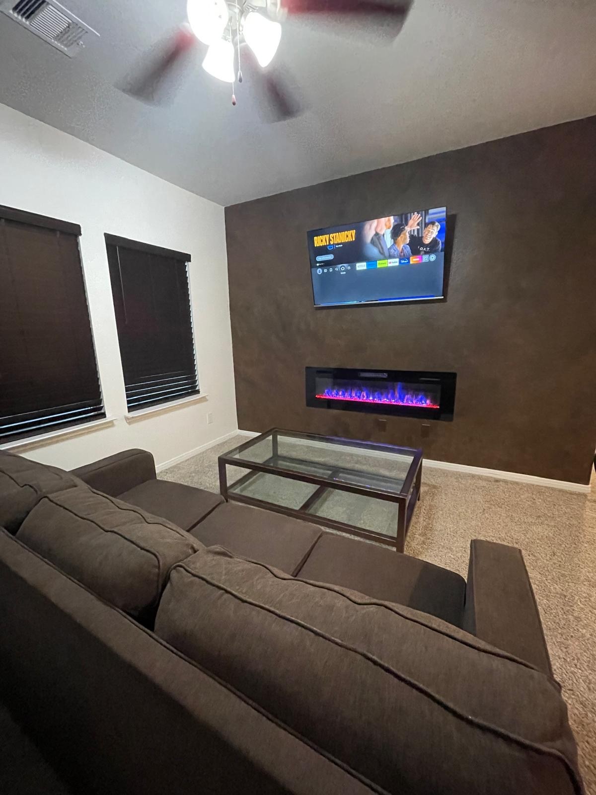 3322 Harvest Meadow Lane Rosenberg, TX 77471 - Photo 38 of 39 a living room with furniture and a flat screen tv