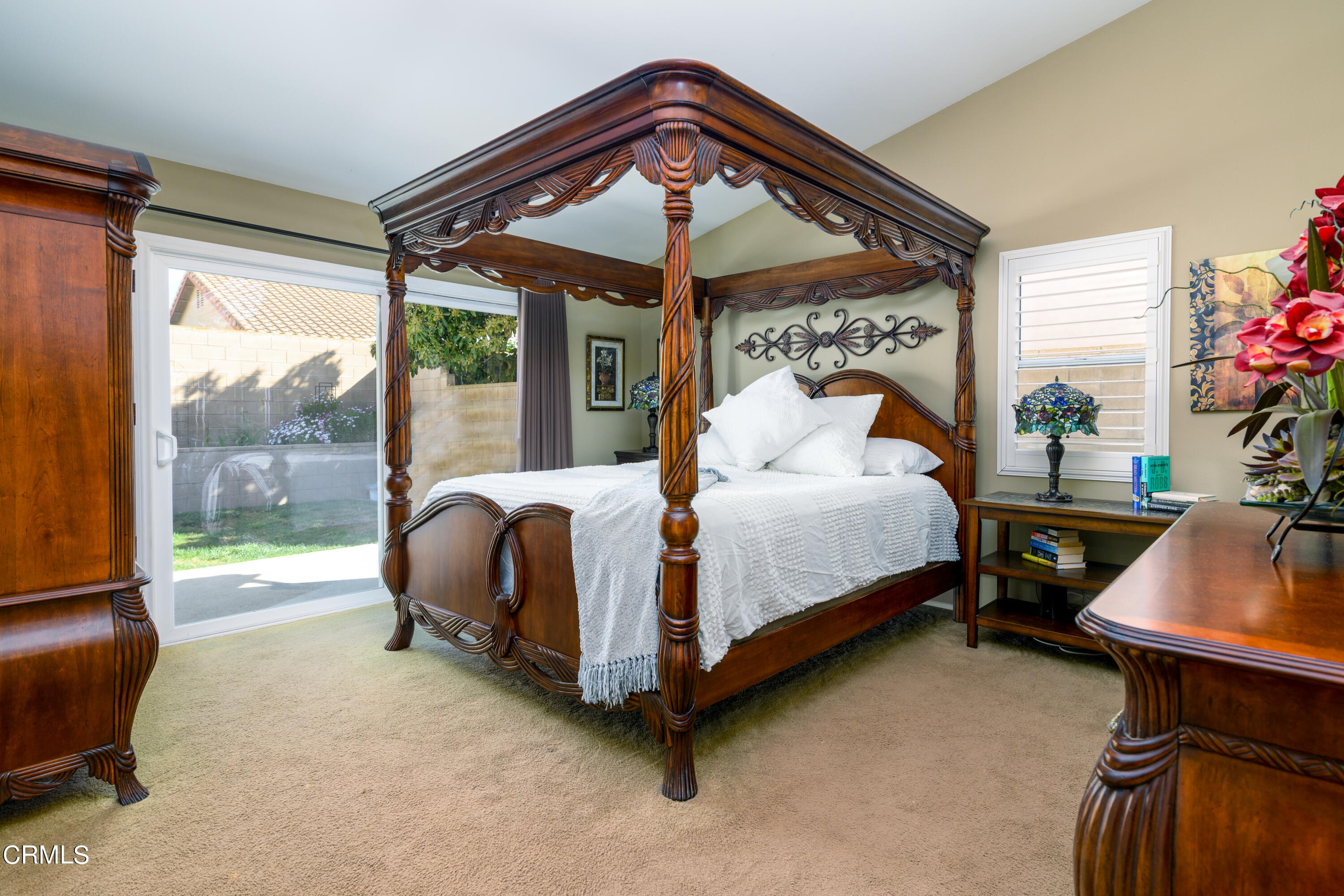 2111 Orlop Place Oxnard, CA 93035 - Photo 14 of 26 a bedroom with a bed and a window in it