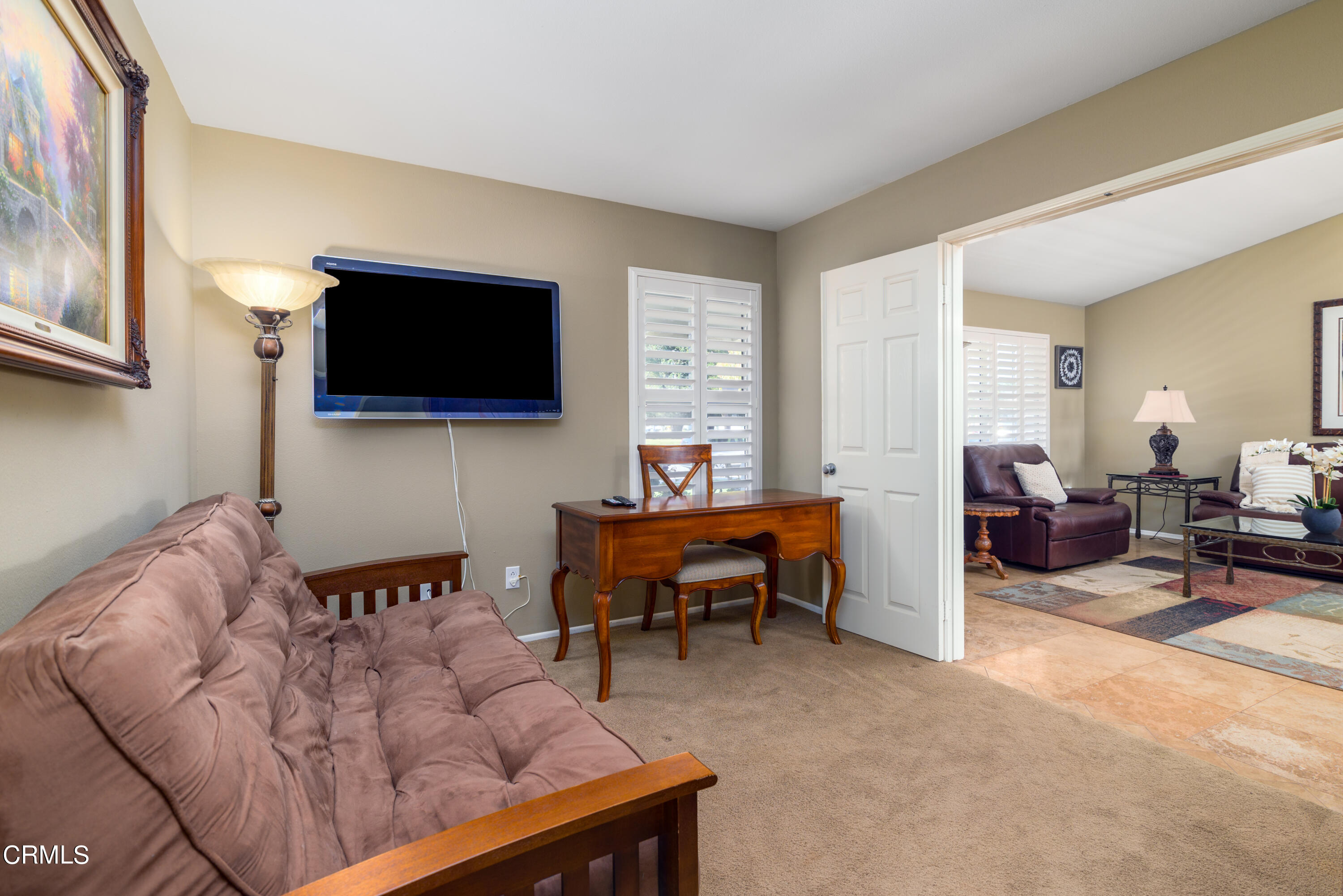 2111 Orlop Place Oxnard, CA 93035 - Photo 17 of 26 a living room with furniture and a flat screen tv