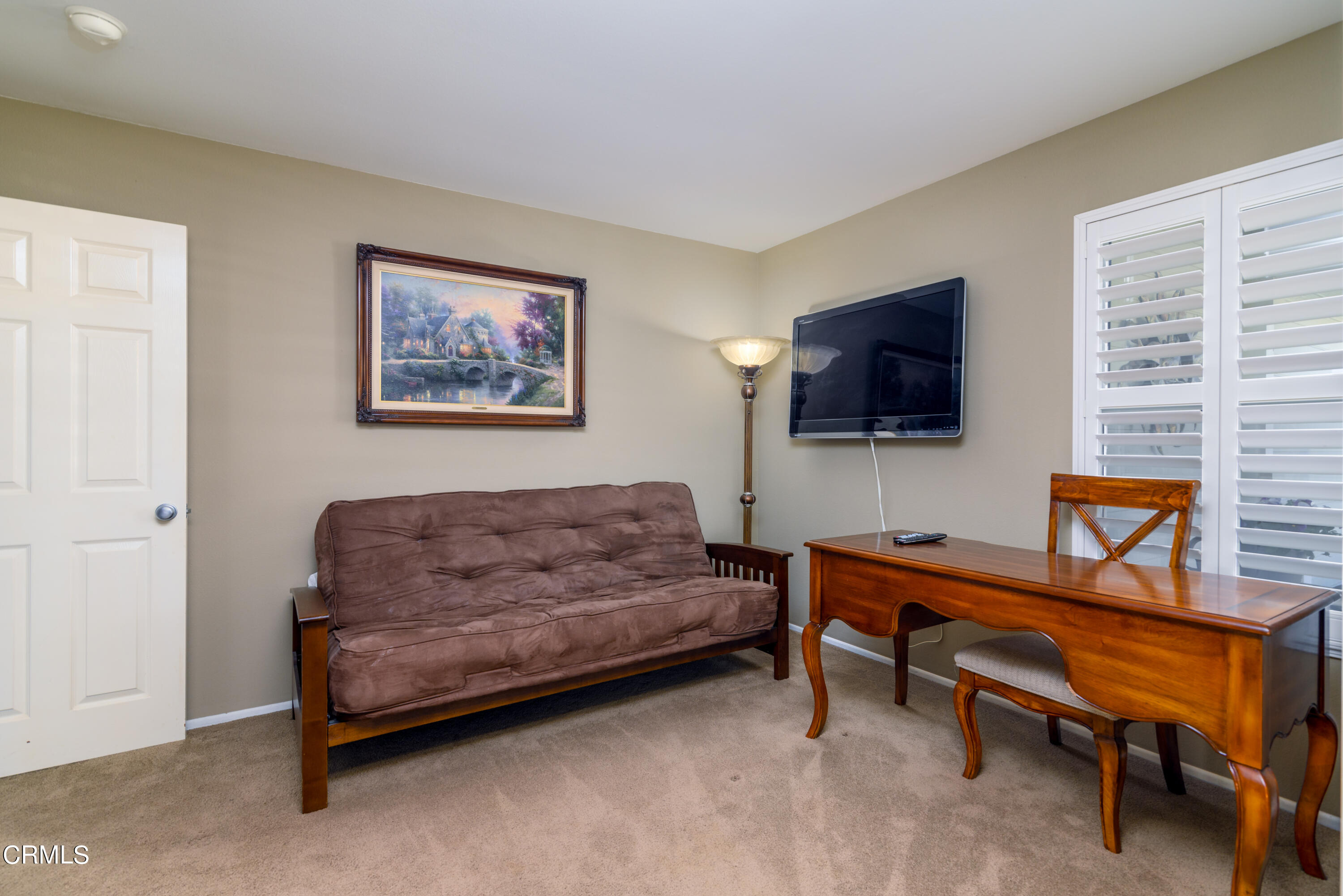 2111 Orlop Place Oxnard, CA 93035 - Photo 18 of 26 a living room with furniture and a flat screen tv