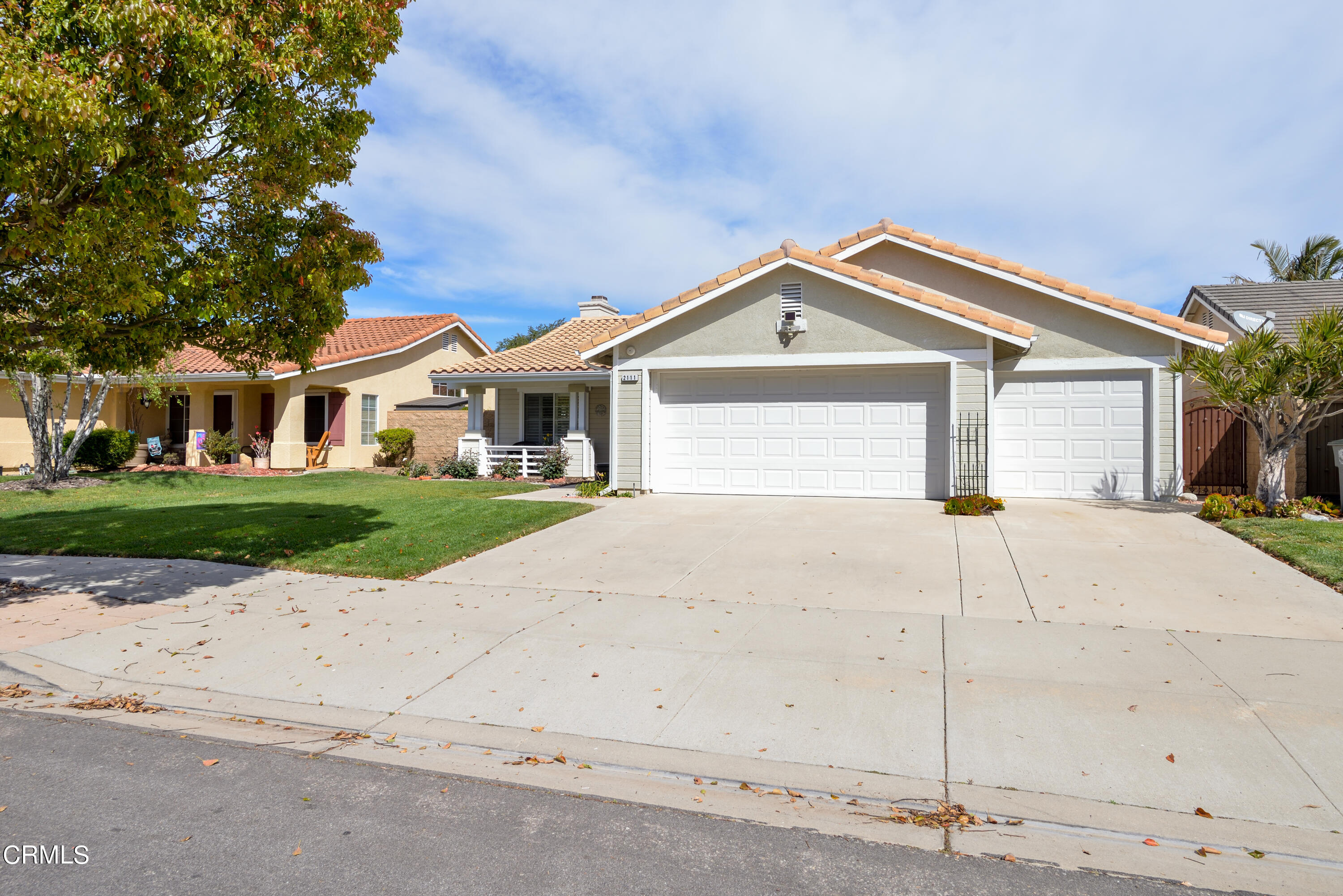 2111 Orlop Place Oxnard, CA 93035 - Photo 26 of 26 a front view of a house with a yard