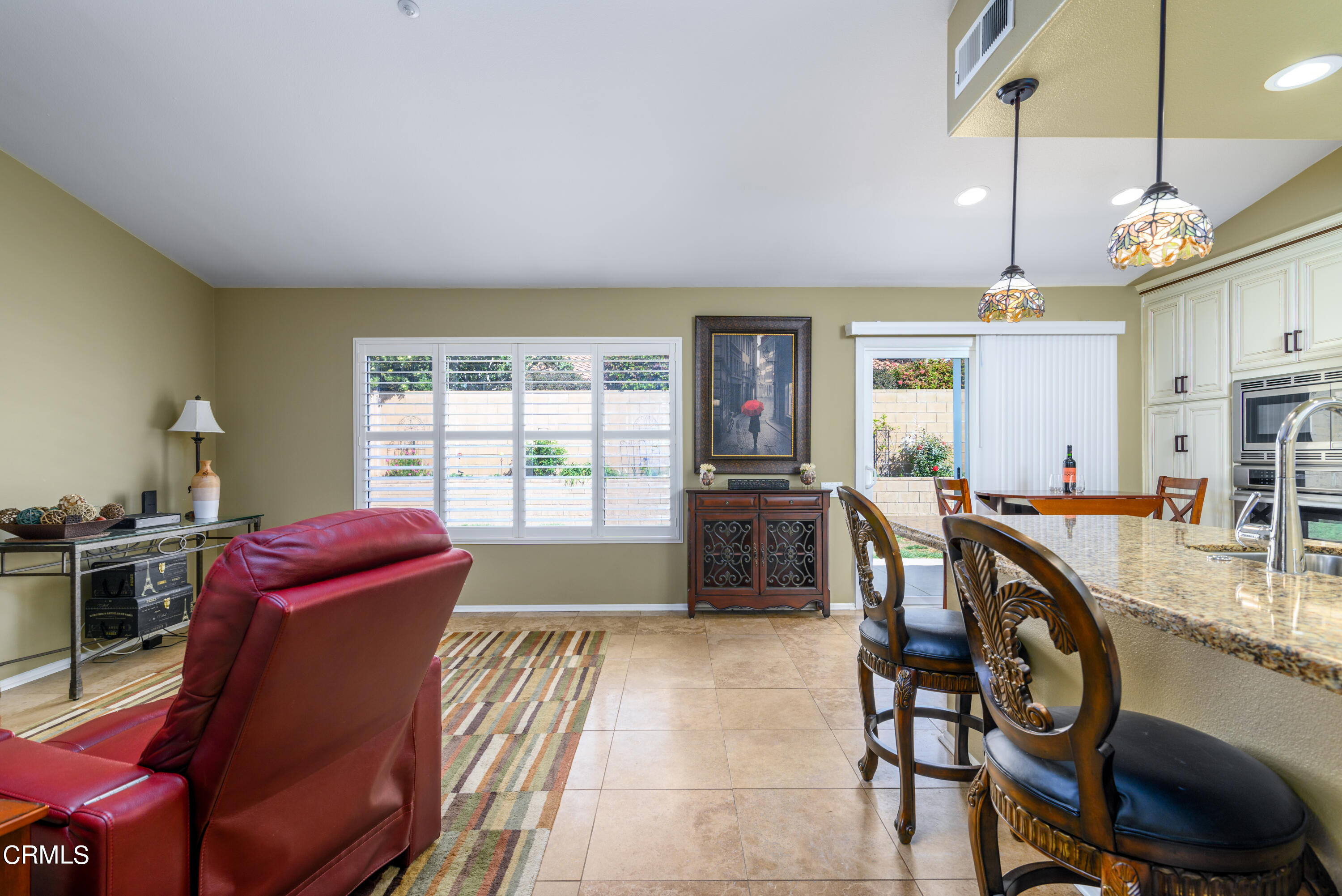 2111 Orlop Place Oxnard, CA 93035 - Photo 10 of 26 a kitchen with stainless steel appliances granite countertop a stove a sink and a refrigerator