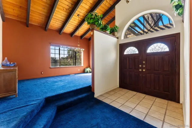 a bathroom with a sink and a large window
