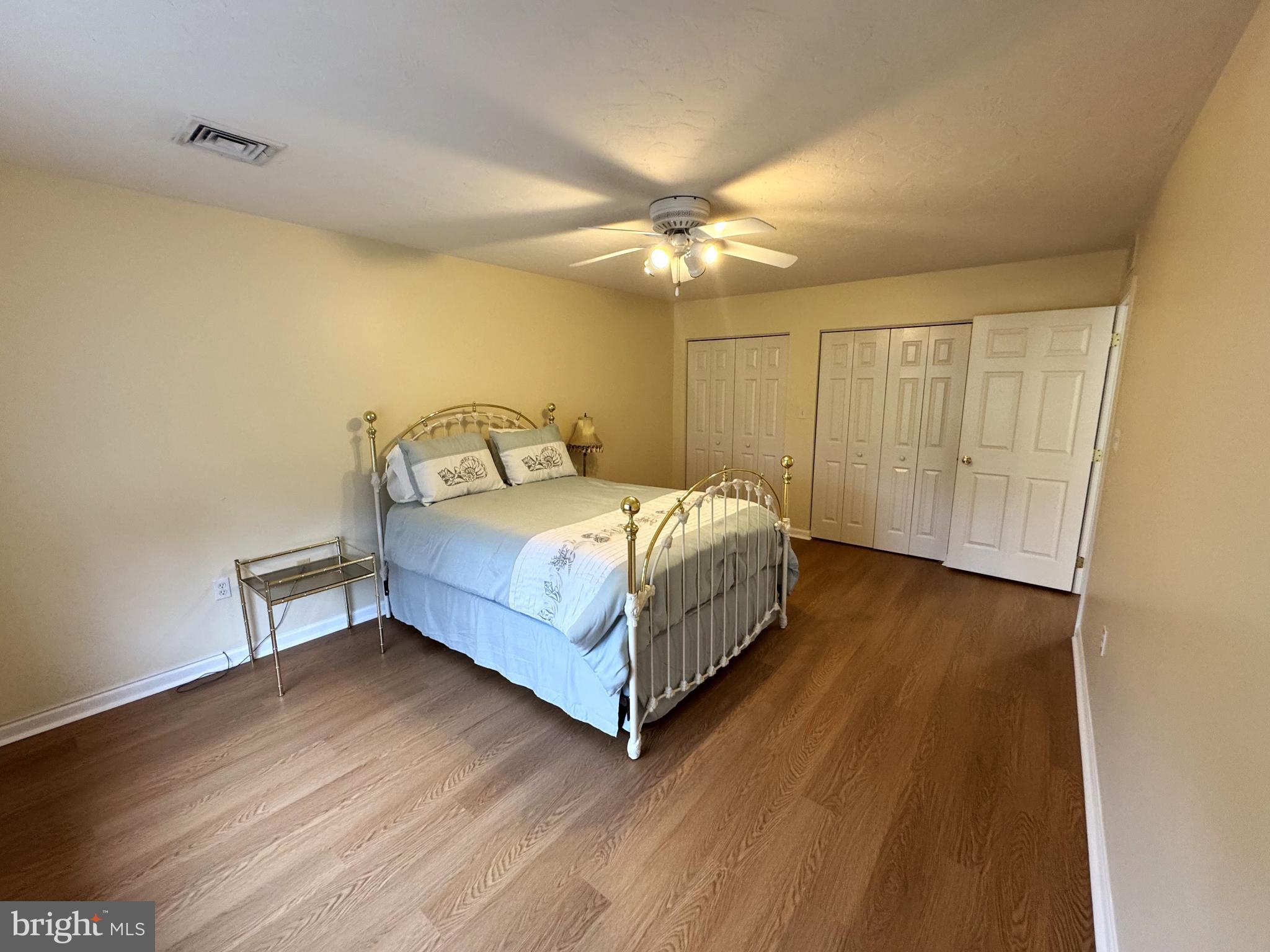 6746 Seneca Ridge Drive York, PA 17403 - Photo 13 of 19 a bedroom with a bed and a chandelier