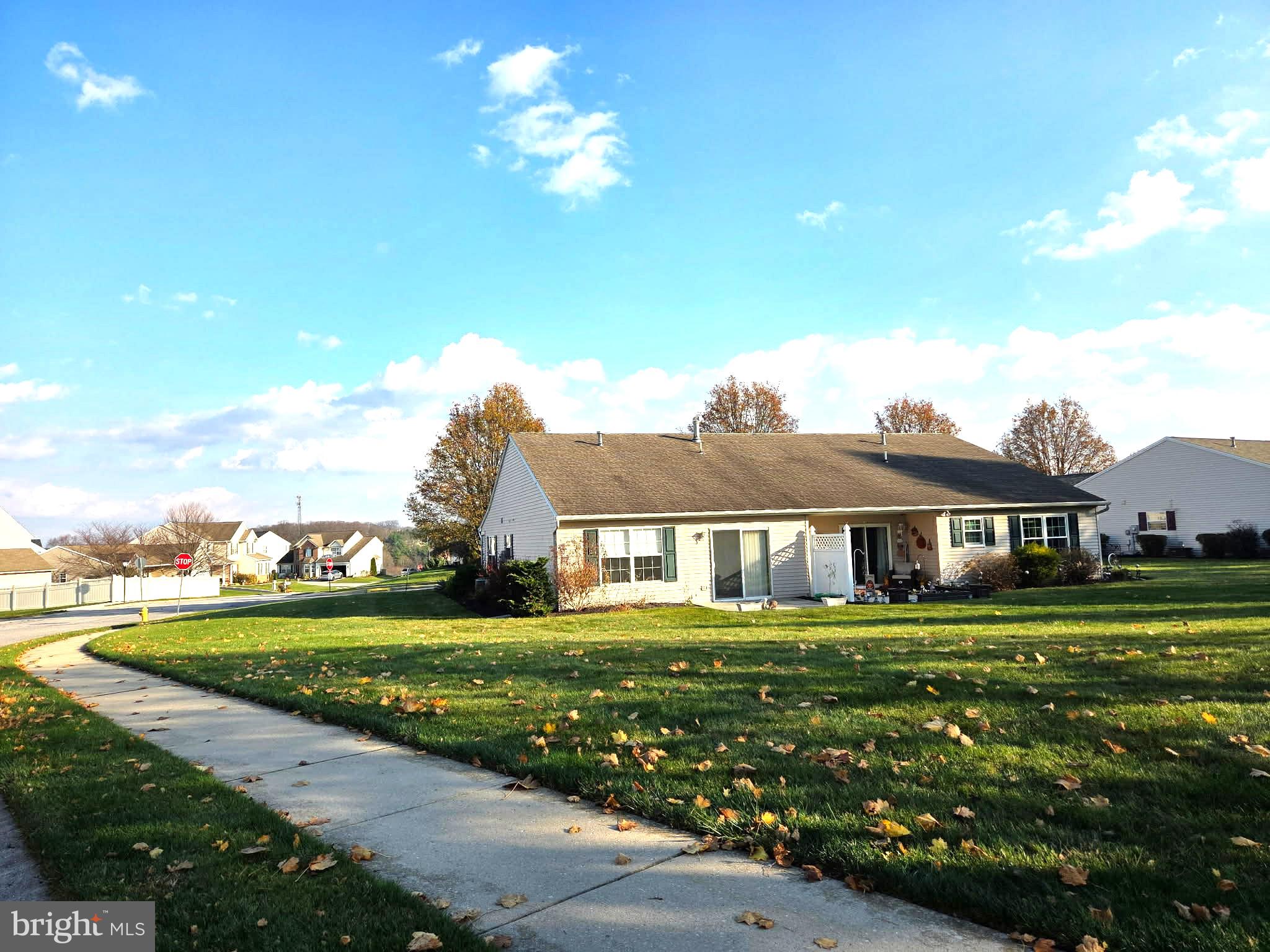 6746 Seneca Ridge Drive York, PA 17403 - Photo 2 of 19 a front view of a house with a garden