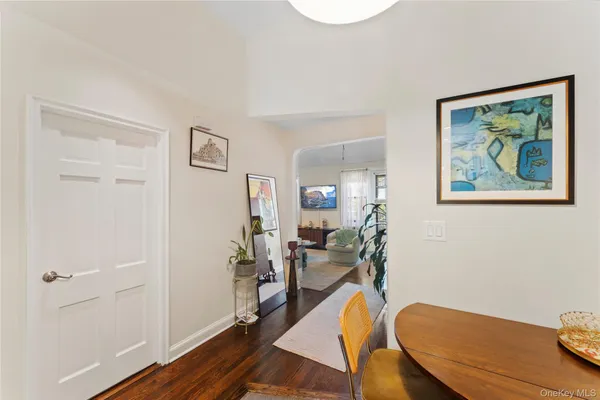 a view of a livingroom with furniture and wooden floor