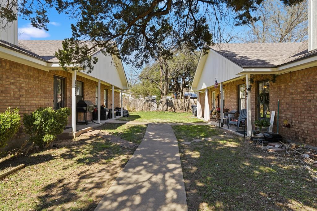 1507 McFerrin Avenue, Unit 9 Waco, TX 76708 - Photo 1 of 26 a view of a building with a trees