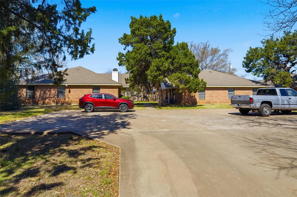 1507 McFerrin Avenue, Unit 9 Waco, TX 76708 - Photo 22 of 26 a view of street with large trees