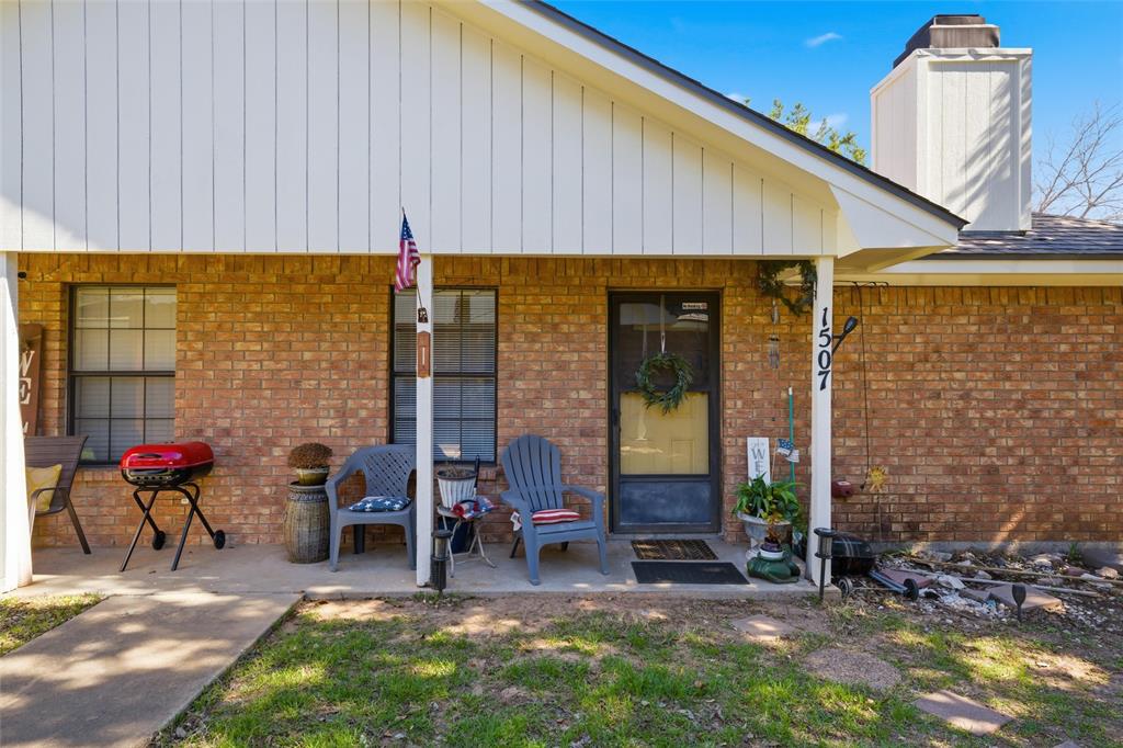 1507 McFerrin Avenue, Unit 9 Waco, TX 76708 - Photo 7 of 26 a view of a patio with table and chairs and potted plants