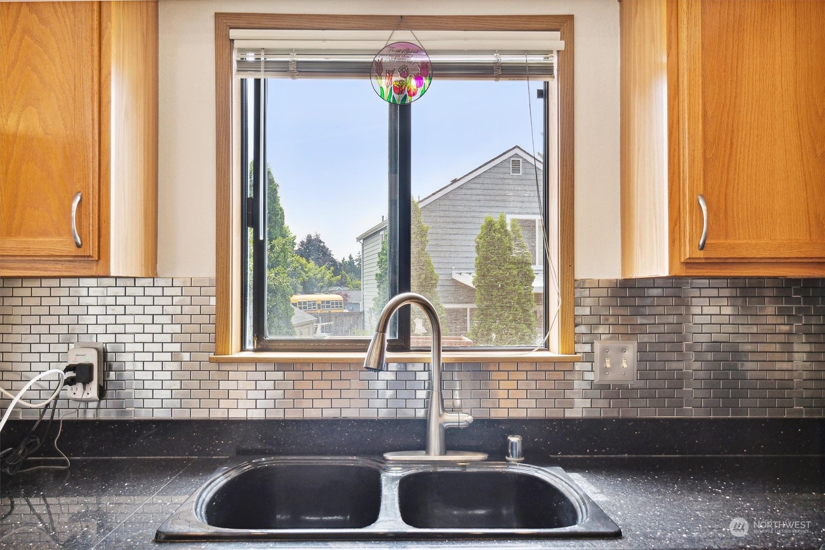 12115 Southeast 280th Street Kent, WA 98030 - Photo 11 of 40 a bathroom with a sink and a window