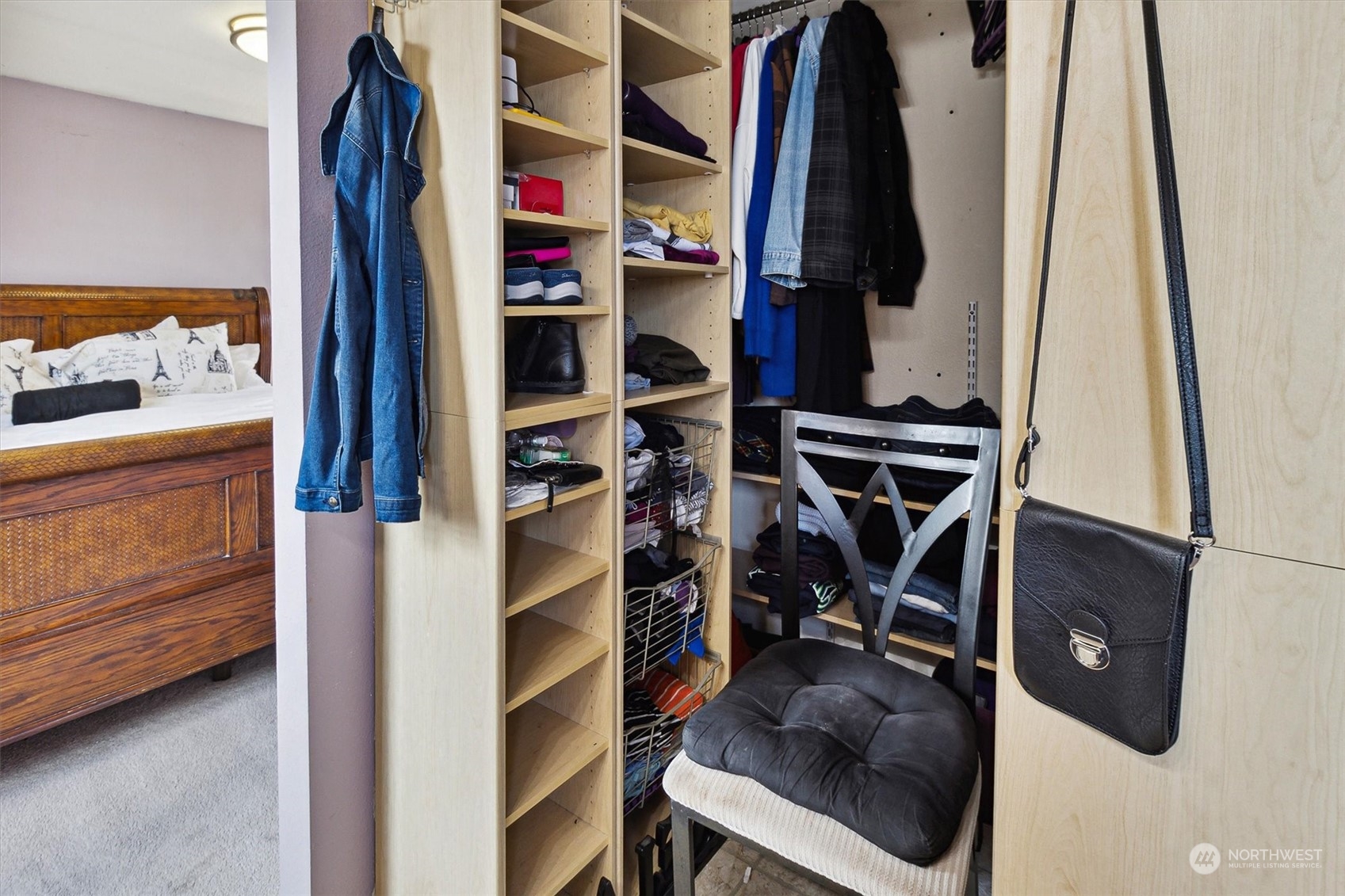 12115 Southeast 280th Street Kent, WA 98030 - Photo 30 of 40 a view of walk in closet with clothes and shoes
